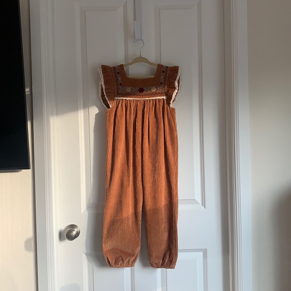 Zara Child Romper, size 4-5 years. Brown, white, cream, blue and red detailing.